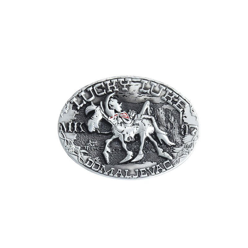 Boucle de ceinture ovale en argent vieilli Anatole avec une représentation en relief de Lucky Luke à cheval et les inscriptions "LUCKY LUKE" et "DOMALJEVAC".