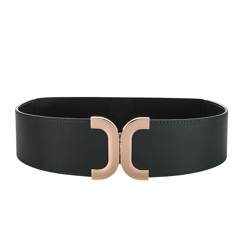 Ceinture femme Charisma en cuir vert avec boucle dorée double C incurvée.