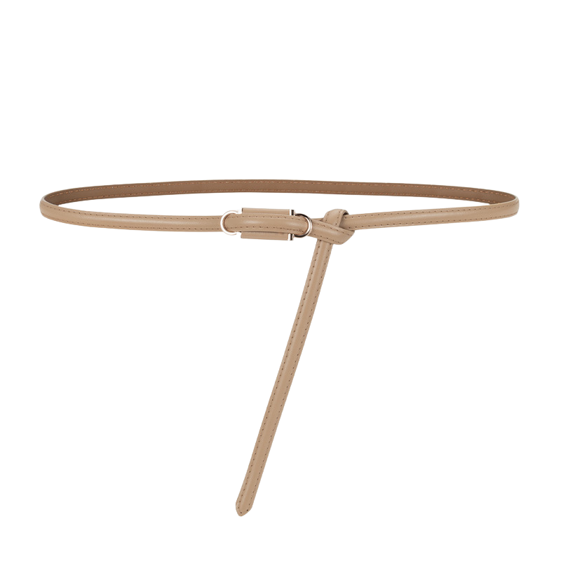 Ceinture fine en cuir beige modèle Étoile avec un nœud décoratif et une boucle argentée.