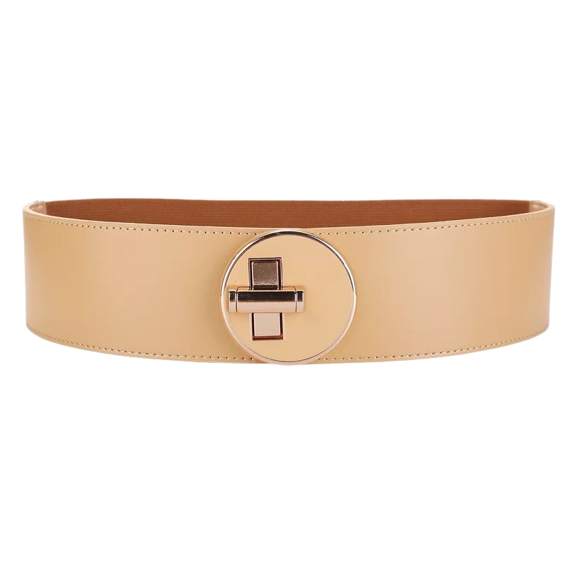 Ceinture large beige pour femme, modèle Fanny, en cuir pleine fleur avec boucle ronde dorée tournante et système de fermeture discret. Parfaite pour ajuster et structurer vos tenues.