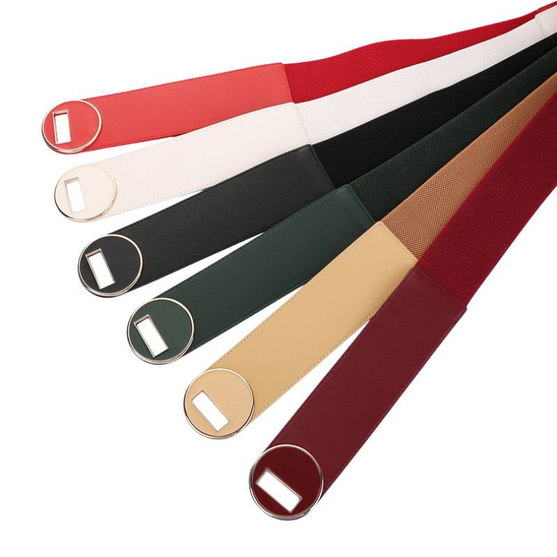 Collection de ceintures Fanny pour femmes, large, avec boucle dorée ronde, disponibles en rouge, blanc, noir, vert, beige et bordeaux.