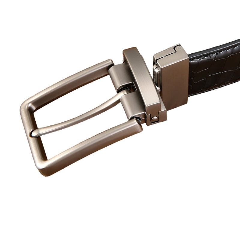 La ceinture Florentin 1 pour homme est dotée d'une boucle ardillon rectangulaire en alliage argenté et d'une lanière réversible en simili cuir noir avec motif crocodile.