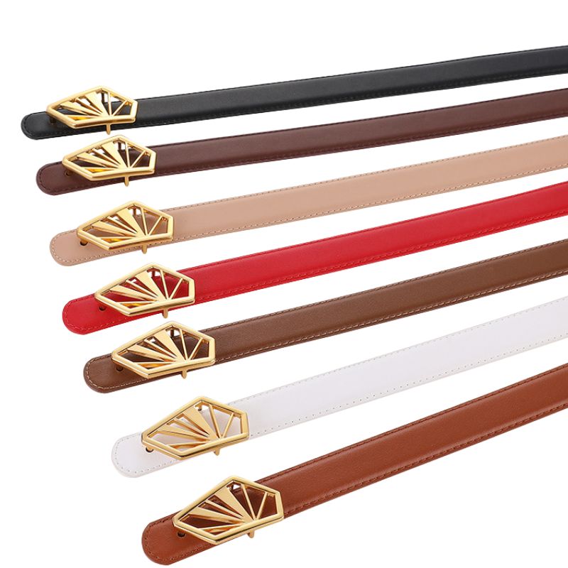 Ceinture femme Glorieuse disponible en plusieurs couleurs, avec une boucle décorative dorée en forme d'éventail.