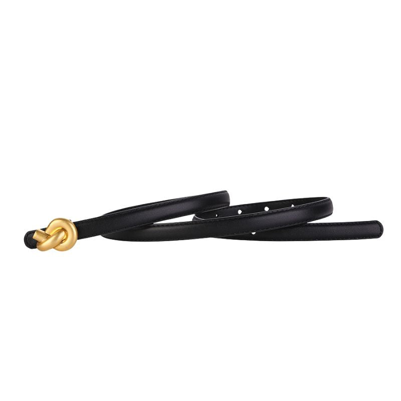 Ceinture fine Inès en cuir noir avec boucle dorée nouée. Idéale pour femme, elle apporte une touche d'élégance à toutes les tenues.