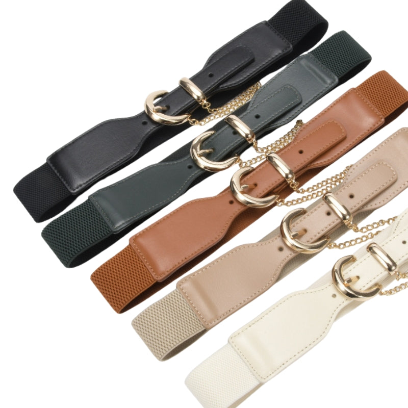 Ceinture femme Mireille en cuir nubuck, large, avec boucle ardillon demi-lune dorée et chaîne décorative, disponible en plusieurs couleurs dont noir, kaki, marron et beige.