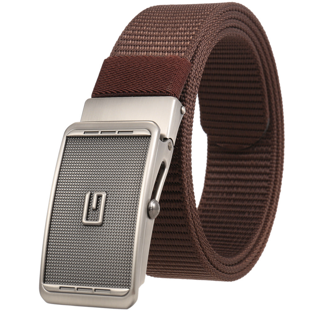 Ceinture homme Monet en tissu marron avec boucle automatique argentée texturée effet grillagé.