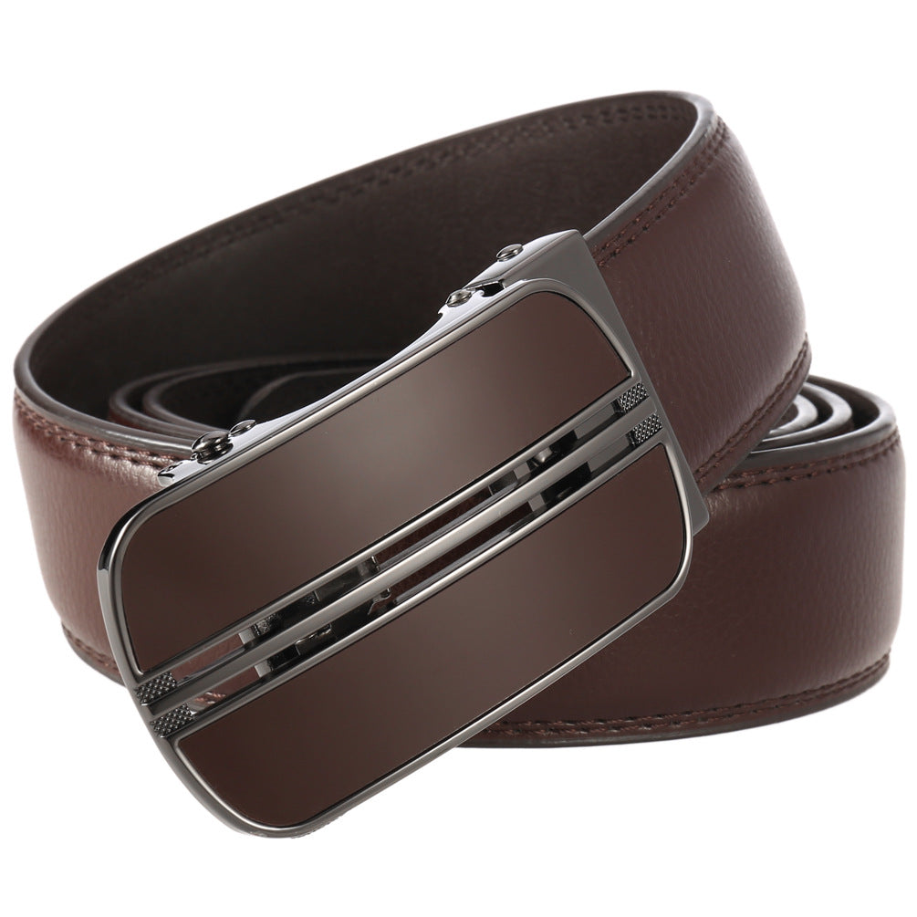 Ceinture Montmart pour homme en cuir marron avec boucle automatique argentée et détails texturés.