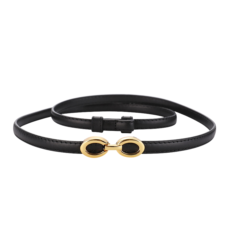 Ceinture fine noire Onirique en cuir avec boucle ovale dorée décorative.
