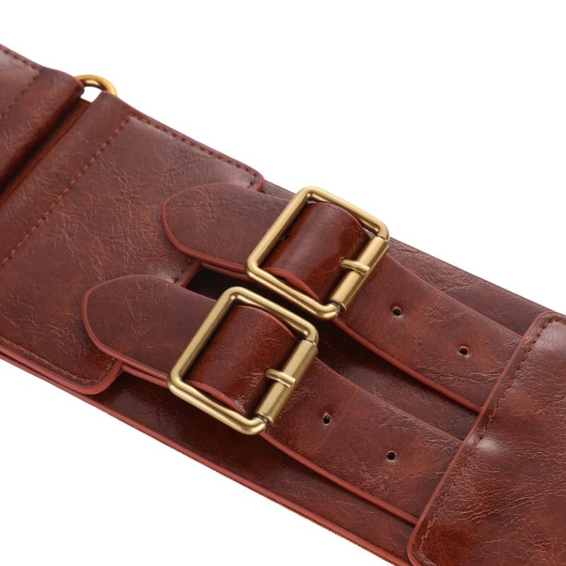 Ceinture large en simili cuir brun foncé pour femme, modèle Soie, avec double boucle ardillon rectangulaire dorée et système de serrage ajustable.