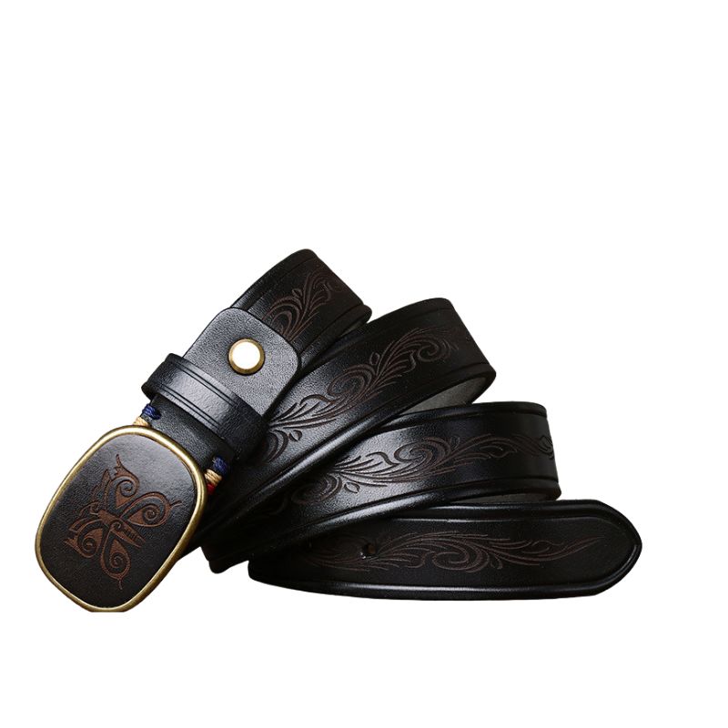 Ceinture Totem d’Acier noire pour homme, en cuir gravé avec une boucle ovale en cuivre doré vieilli et un motif ethnique. #fullwidth
