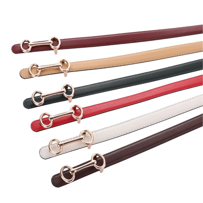 Ceinture pour femme Transparence en cuir pleine fleur, disponible en plusieurs couleurs (bordeaux, beige, vert foncé, rouge, blanc, marron foncé) avec boucle dorée décorative en forme de mors de cheval.