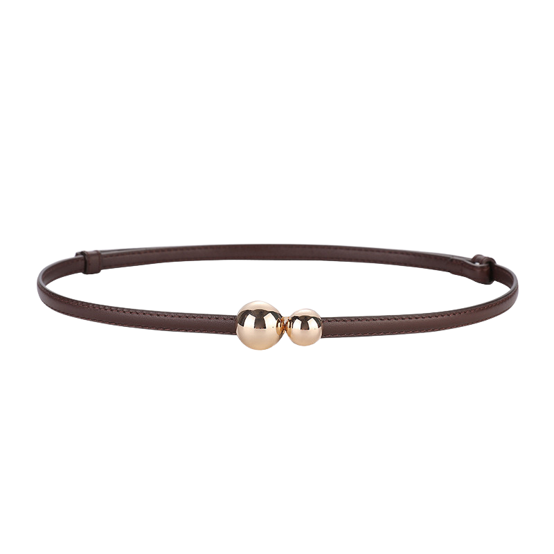 Ceinture fine Ursuline en cuir marron avec deux boules dorées décoratives remplaçant la boucle.