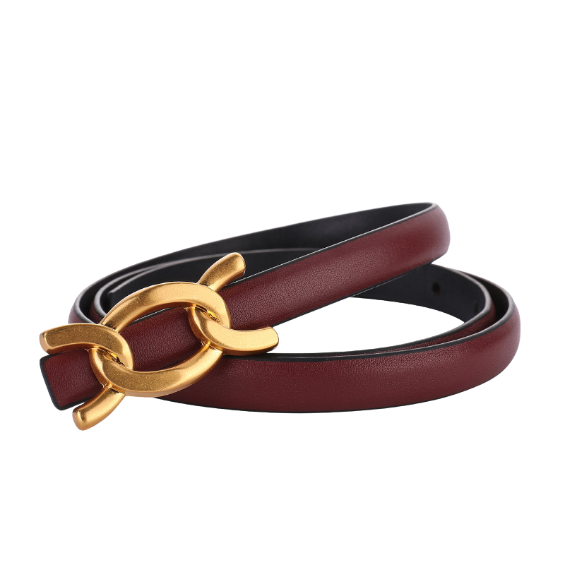 Ceinture fine pour femme Zénaïde en cuir bordeaux avec boucle dorée double anneau entrelacé, style minimaliste et élégant.