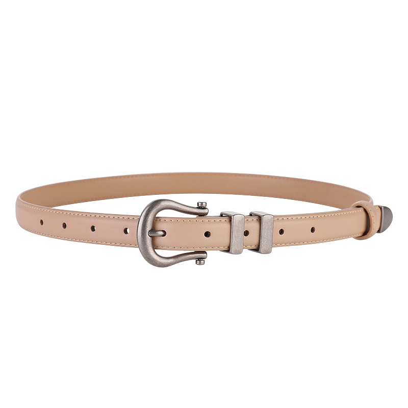 Ceinture femme Angélique en cuir beige avec boucle ardillon argentée vieillie et design asymétrique, 1,8 cm de large.