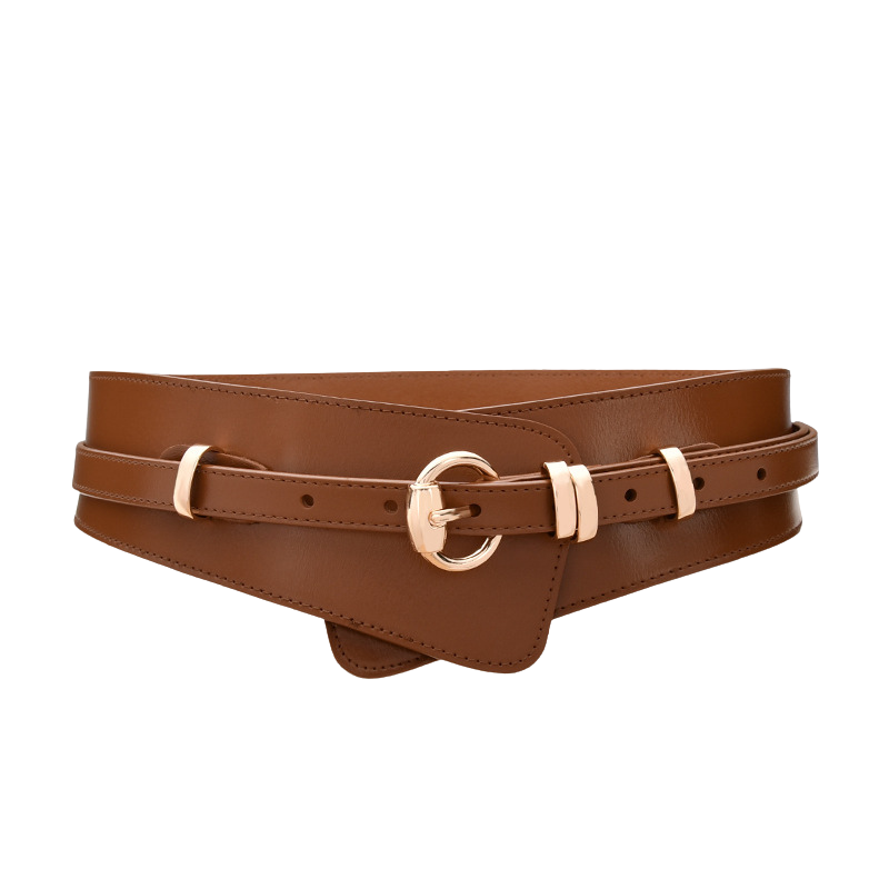 Ceinture Camélia en cuir marron avec boucle dorée circulaire et lanière fine détachable, idéale pour marquer la taille.