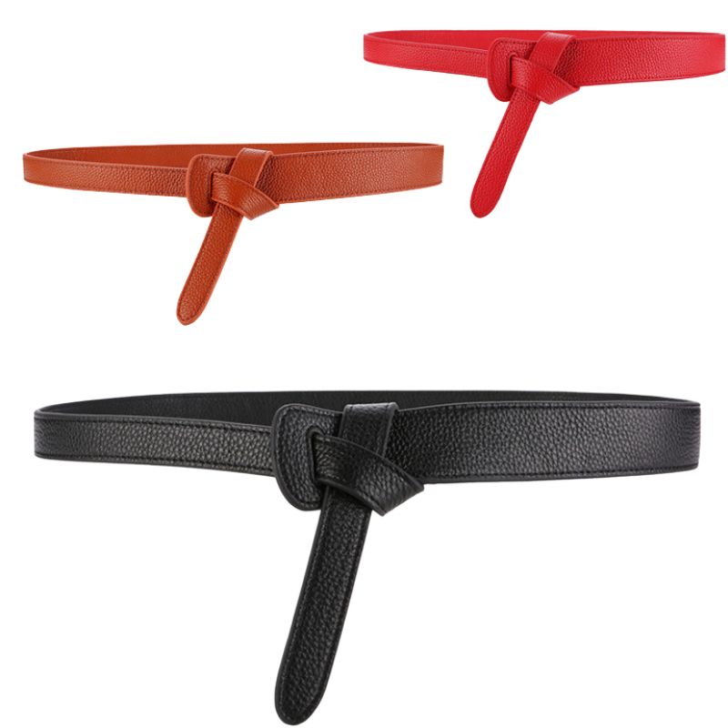 Ceinture Clotilde en cuir grainé pour femme, disponible en noir, rouge et marron, avec boucle à nouer discrète.