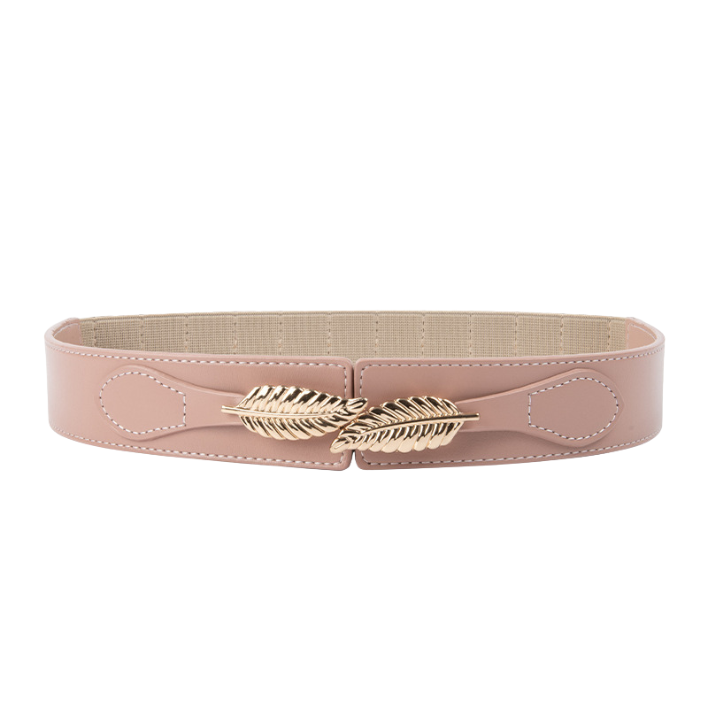 Ceinture élastique pour femme Daphné rose avec boucle dorée en forme de feuilles, élégante et ajustable.
