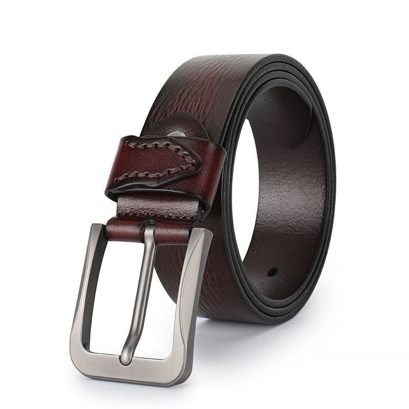 Ceinture Émile Bleu 2 en cuir de vachette marron foncé avec boucle ardillon rectangulaire argentée et lanière texturée.