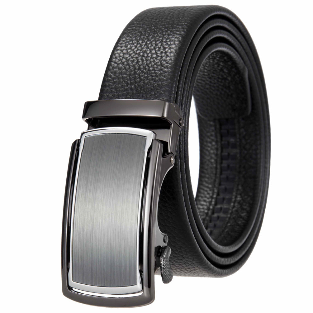 Ceinture homme Émile Or noire avec boucle automatique rectangulaire argentée et nervurée, en cuir texturé.
