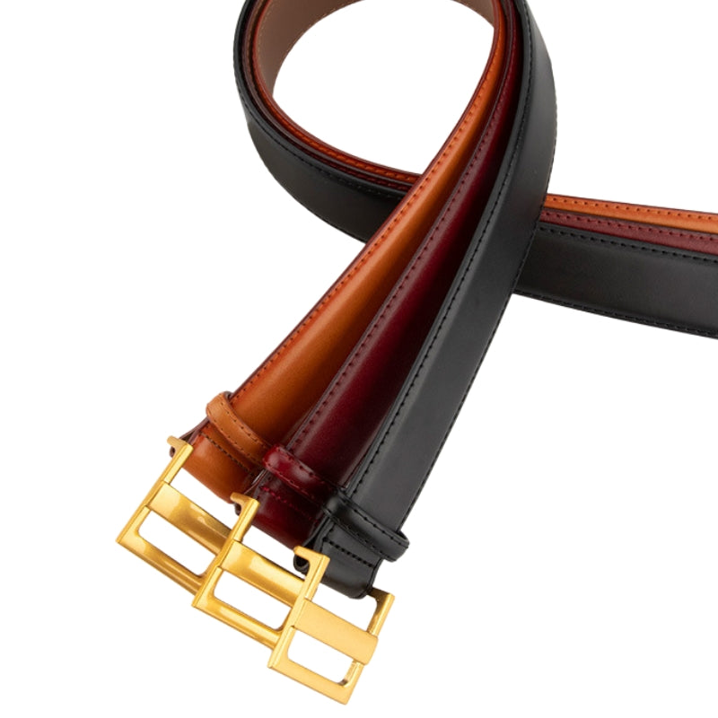 Ceinture femme Innocente en cuir refendu de vachette, disponible en noir, bordeaux et cognac, avec une boucle rectangulaire dorée.