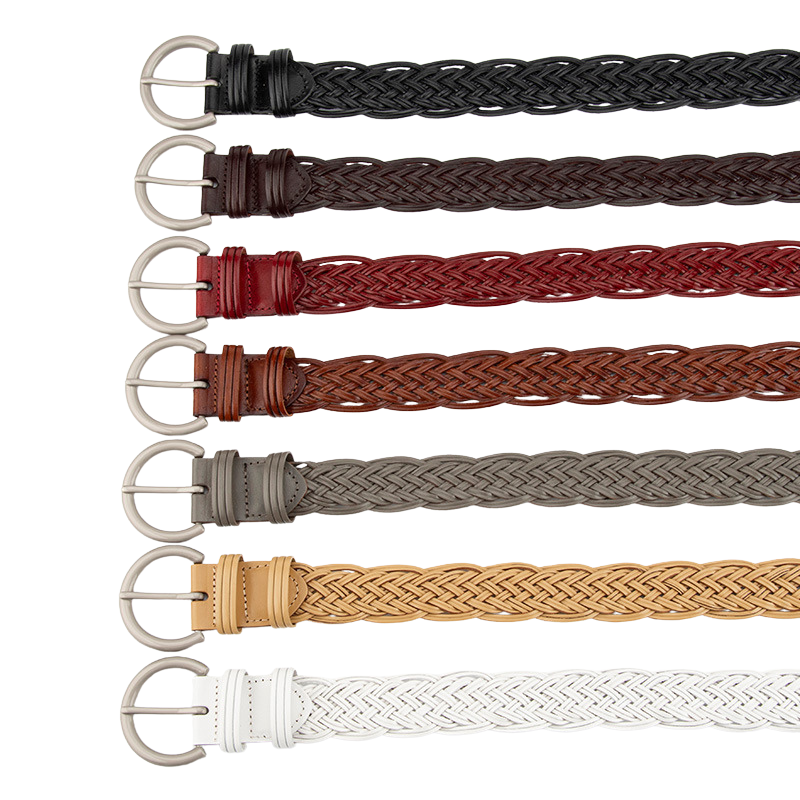 Ceinture femme Irisée tressée et ajourée, disponible en plusieurs coloris : noir, marron foncé, bordeaux, marron clair, gris, beige et blanc. Fermoir boucle demi-cercle argenté.
