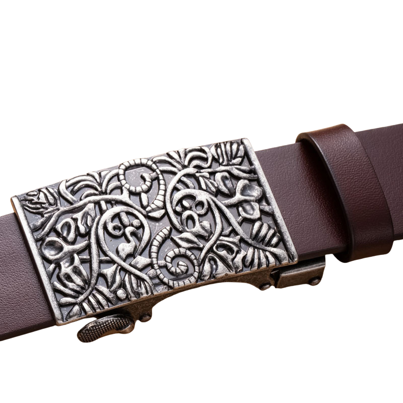 Ceinture Maréno pour homme en cuir marron avec boucle automatique argentée ornée d'un motif floral sculpté complexe.