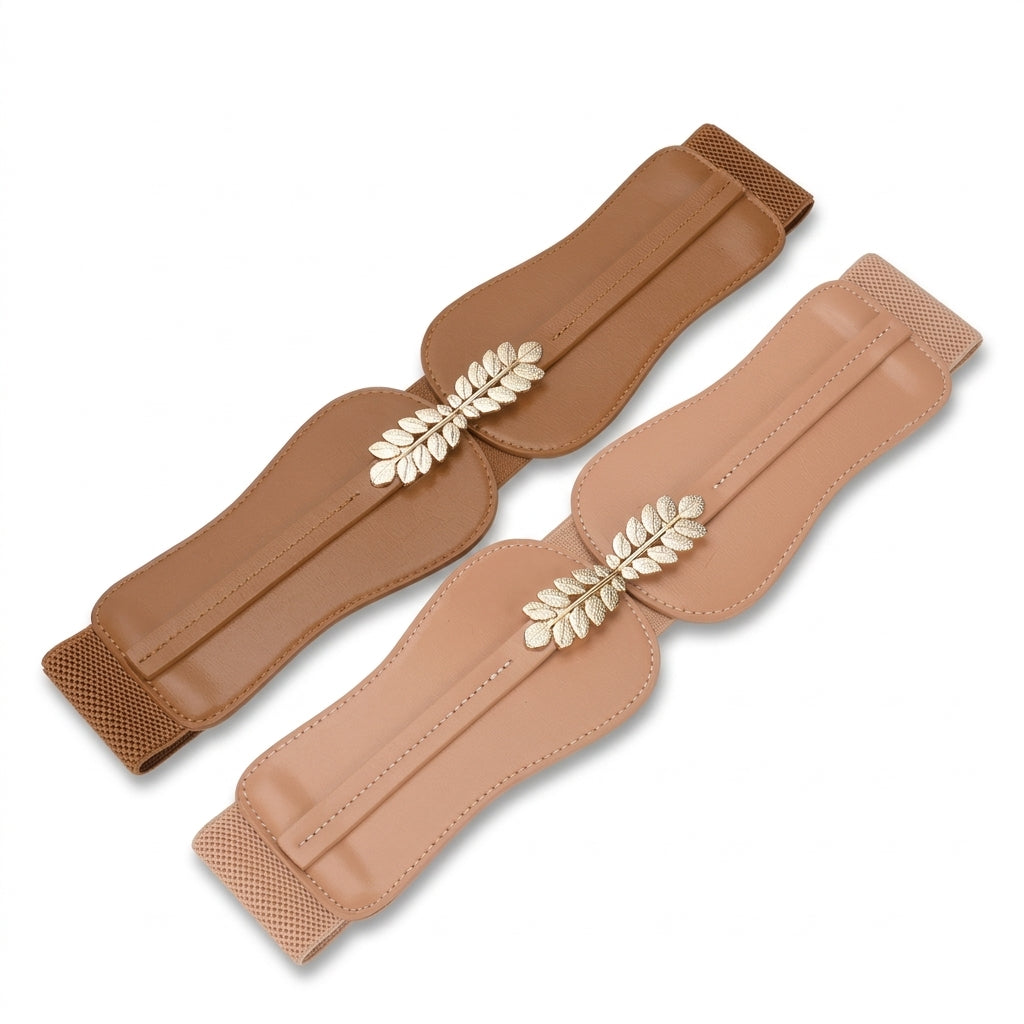Deux ceintures larges pour femme Mélisande en cuir pleine fleur, disponibles en nuances de beige et camel, ornées d'une boucle ardillon métallique dorée en forme de feuilles.