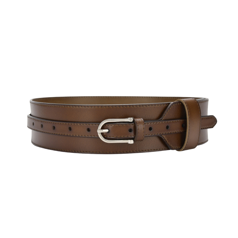Ceinture extra large Mélissa en cuir marron foncé avec boucle argentée.