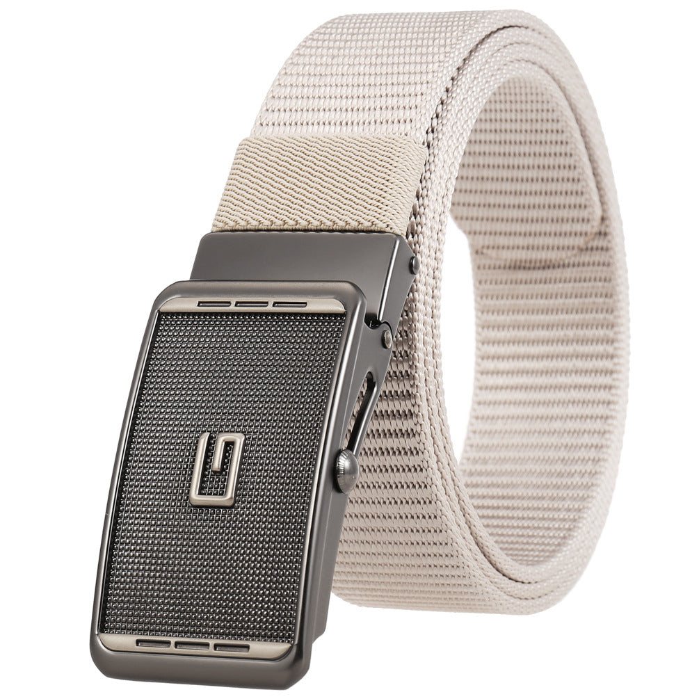 Ceinture homme Monet en tissu beige avec boucle automatique argentée texturée et logo discret.