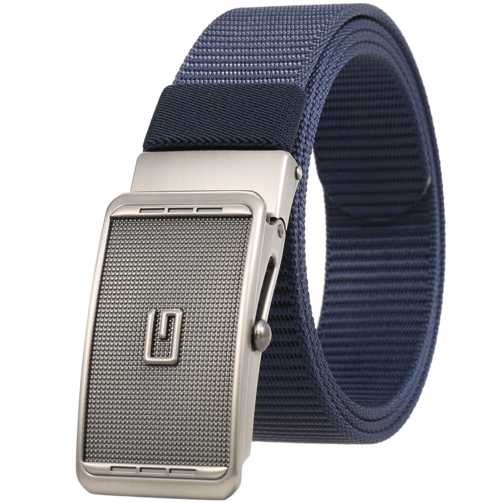Ceinture homme Monet bleue marine avec boucle automatique argentée texturée et logo en relief, lanière en tissu résistant.