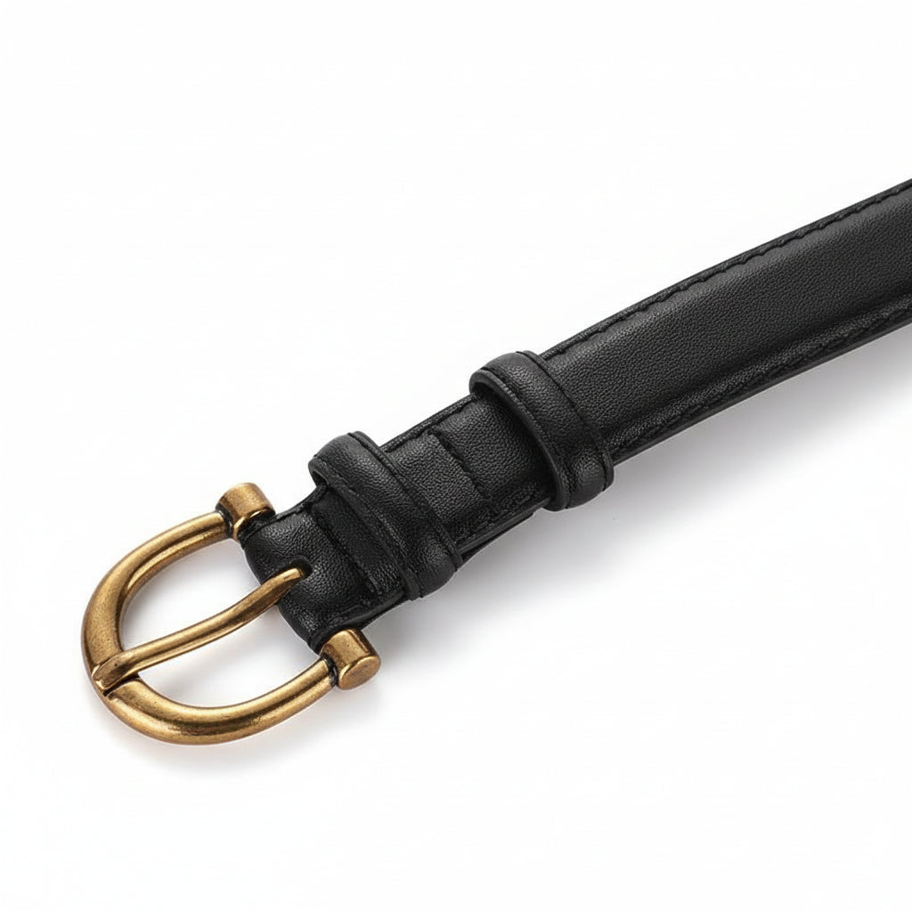 Ceinture Prisca noire en cuir refendu avec boucle ardillon dorée finition bronze patiné.