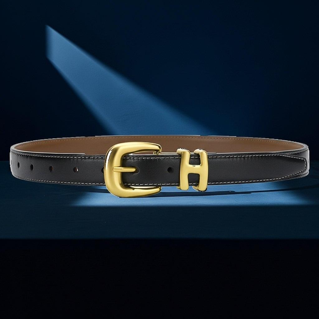 Ceinture femme Rêveuse noire en cuir pleine fleur avec boucle ardillon dorée ornée d'un H, couture contrastante et finition lisse. #fullwidth