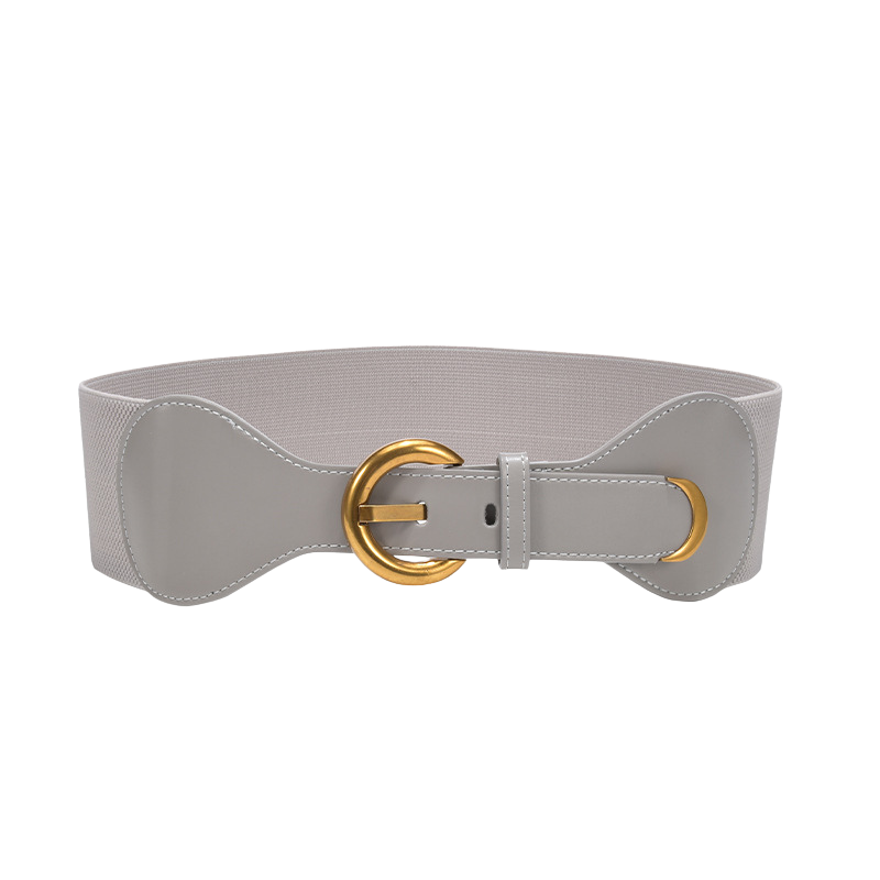 Ceinture femme Sybille grise avec boucle dorée ronde. Une ceinture élastique et confortable en cuir verni refendu.