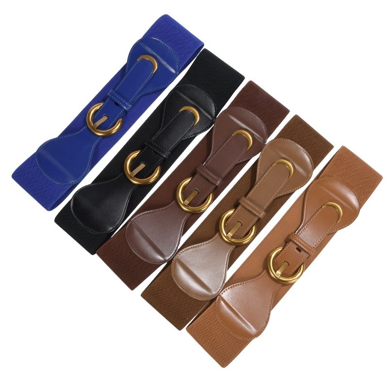 Ceinture élastique Sybille pour femme, disponible en bleu, noir, marron foncé, marron clair et camel, avec boucle dorée.