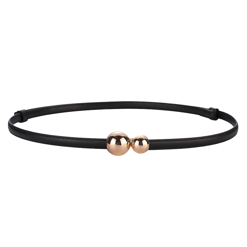 Ceinture fine noire Ursuline en cuir avec deux boules dorées décoratives au centre, sans boucle traditionnelle.