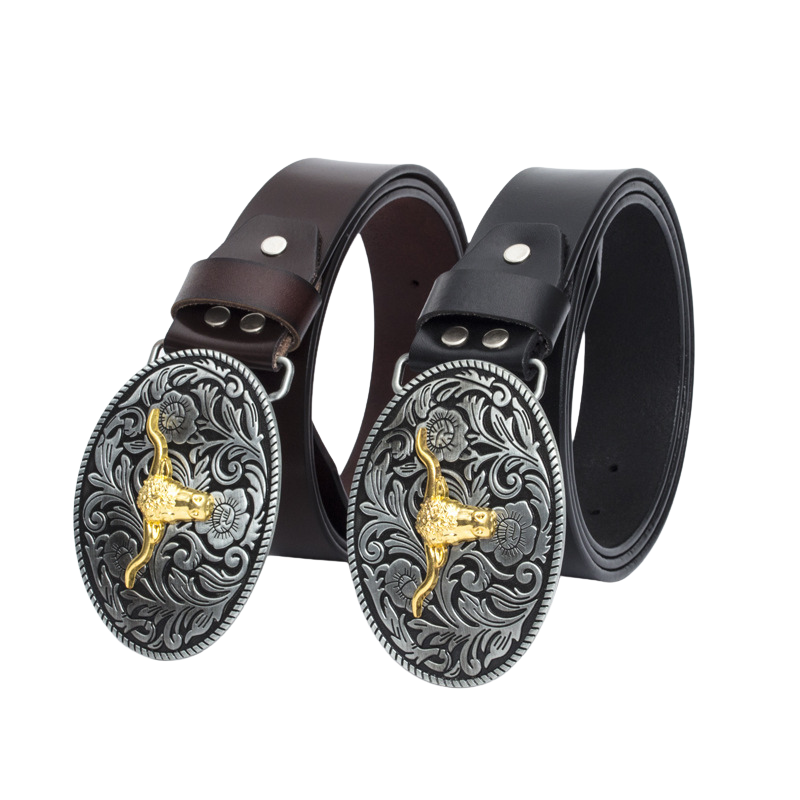 Ceinture homme Victorine 1 avec boucle ovale ornée d'une tête de taureau dorée et de motifs floraux argentés, cuir marron et noir.